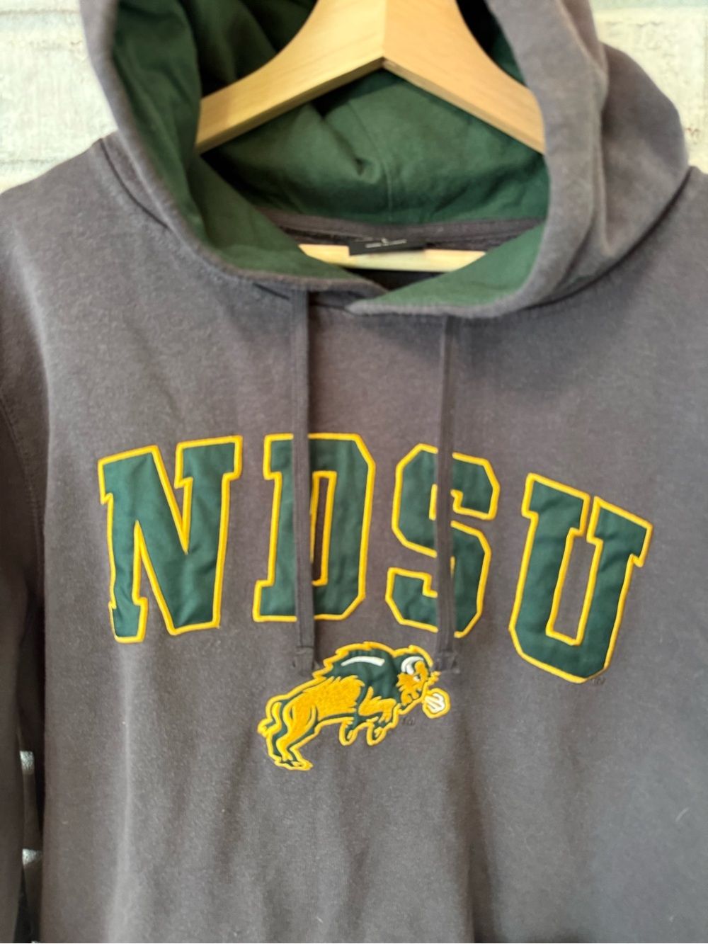 Colosseum Charcoal Hoodie with Green and Gold NDSU Logo